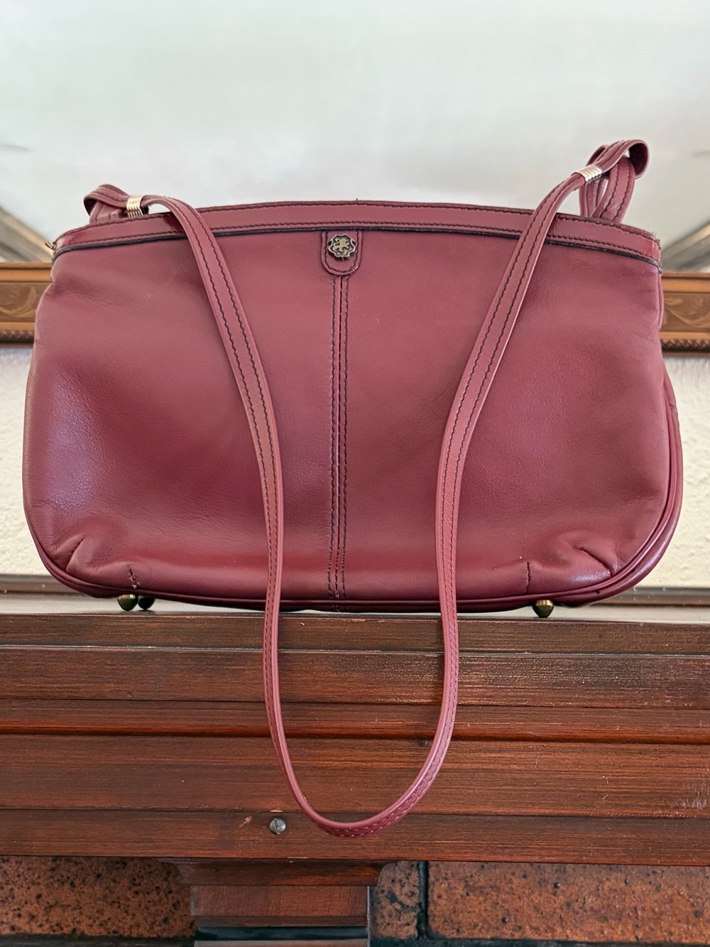Vintage John Romain Purse Burgundy Leather Brass Feet Lined Logo Emblem Strap